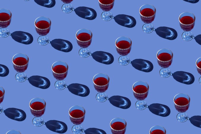 Top view of wine glasses on the blue background