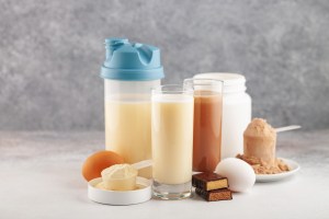 Protein sport shake, powder eggs and bar. Fitness food and drink. Diet
