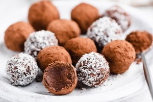 Homemade chocolate truffles with cocoa and coconut